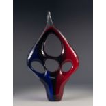 MID CENTURY MURANO BLUE, RED AND BLACK CASED GLASS SCULPTURE IN THE MODERNIST STYLE, hot worked into