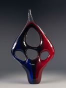 MID CENTURY MURANO BLUE, RED AND BLACK CASED GLASS SCULPTURE IN THE MODERNIST STYLE, hot worked into