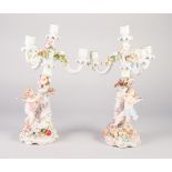 A PAIR OF LATE NINETEENTH/EARLY TWENTIETH CENTURY GERMAN SITZENDORF PORCELAIN TRIPLE BRANCH FOUR