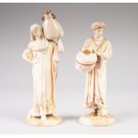 A PAIR OF LATE VICTORIAN ROYAL WORCESTER PORCELAIN MOORISH FIGURES AS WATER CARRIERS, the blushed