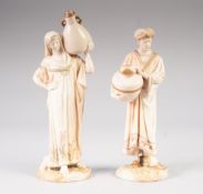 A PAIR OF LATE VICTORIAN ROYAL WORCESTER PORCELAIN MOORISH FIGURES AS WATER CARRIERS, the blushed