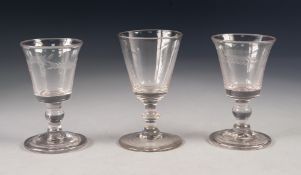PAIR OF ANTIQUE STEMMED DRINKING GLASSES, each with flared bowl, wheel cut with wheat sheaves, above