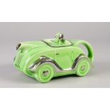 SADLERS STYLE GREEN GLAZED RACING CAR PATTERN POTTERY TEAPOT, heightened in platinum lustre, 'MADE