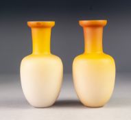 PAIR OF LATE VICTORIAN FADING YELLOW CASED GLASS VASES, each of Indian club form, 6 ¾" (17.2cm)