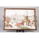 TWO HANDLED WOODEN TRAY HOUSING A SIX TILE PRINTED PICTURE OF A FROZEN DUTCH LAKE SCENE, AFTER L.C.