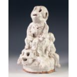 WHITE GLAZED STUDIO POTTERY GROUP, modelled as skeletal figures and dragon, 8 ½" (21.6cm) high,