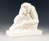 A 1930's WEDGWOOD WHITE GLAZED MODEL by John Skeaping of an ape cradling its offspring, on a