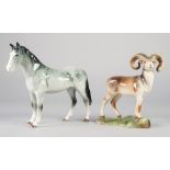 BESWICK MODEL OF A MOUNTAIN GOAT, 7 1/2" high and BESWICK MODEL OF A STANDING GREY HORSE, 8 1/4"