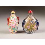 A GOOD CHINESE CLEAR AND BLUE OVERLAY CAMEO GLASS SNUFF BOTTLE, enamelled on each side with birds