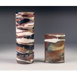 BABS TAYLOR, TWO RAKU FIRED STUDIO POTTERY VASES, one of elliptical, footed form, 5" (12.7cm)