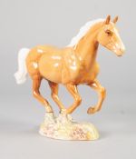 BESWICK MODEL OF A GALLOPING PALAMINO HORSE, No. 1374, 7 1/4" high