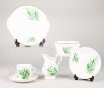 NINETEENTH CENTURY ENGLISH PORCELAIN PART TEA SERVICE, originally for 12 persons but sufficient
