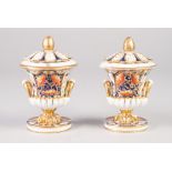 A PAIR OF EARLY NINETEENTH CENTURY DERBY PORCELAIN 'JAPAN' DECORATED TWO HANDLED CAMPANA SHAPE POT