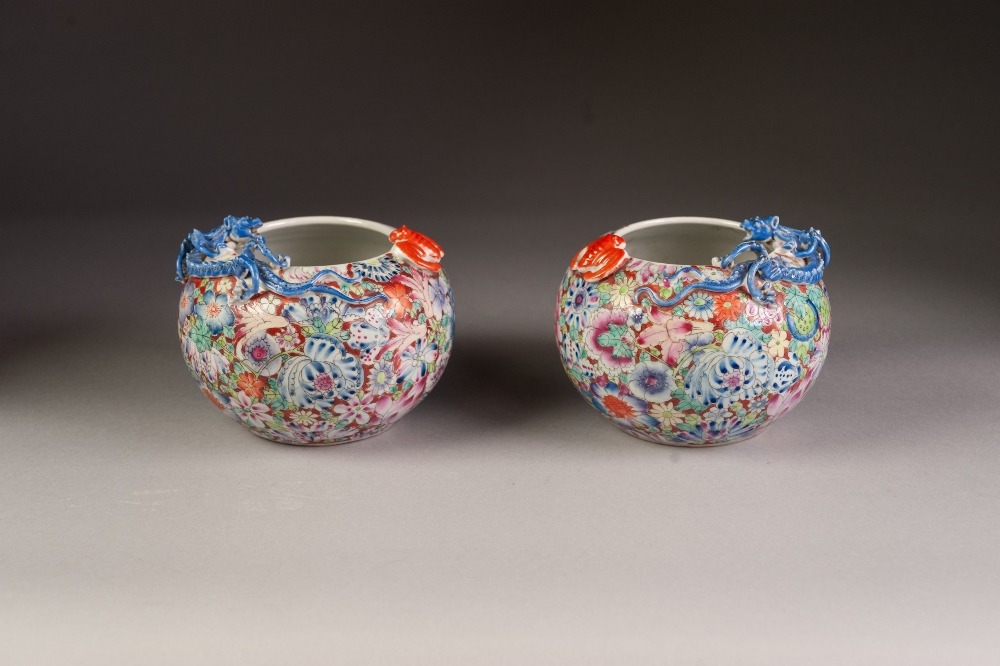 A PAIR OF CHINESE LATE QING DYNASTY PORCELAIN COMPRESSED GLOBULAR VASES, decorated autour with '