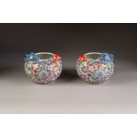 A PAIR OF CHINESE LATE QING DYNASTY PORCELAIN COMPRESSED GLOBULAR VASES, decorated autour with '