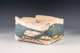 HEAVY STUDIO POTTERY BOWL, of shallow oblong, slab sided form, glazed in blue on an off-white