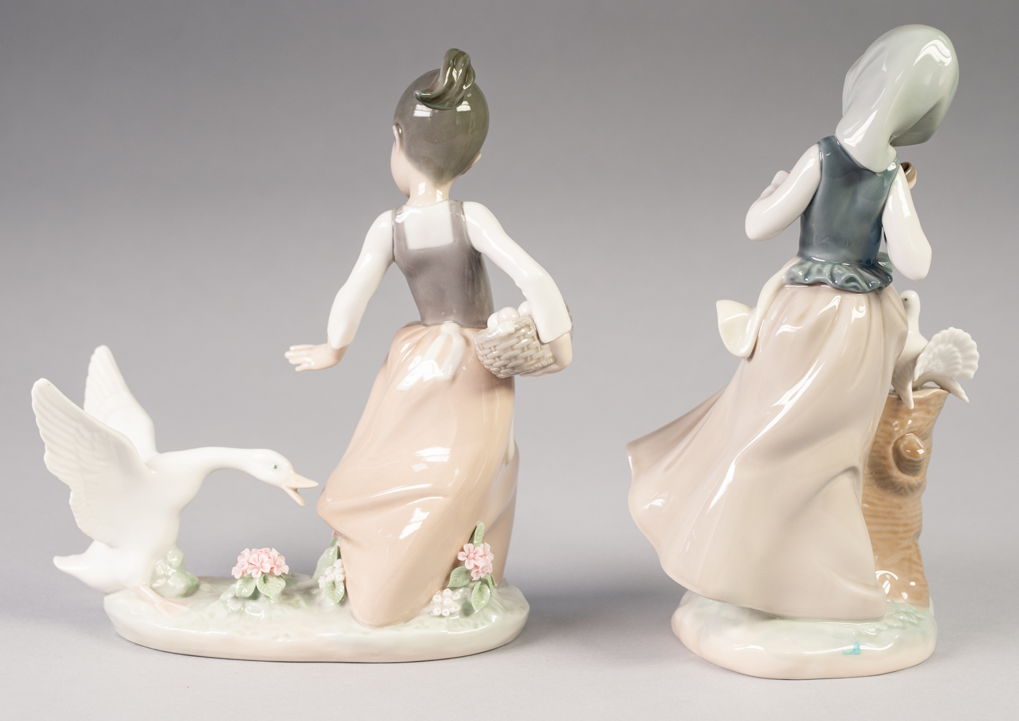 TWO LLADRO PORCELAIN GROUPS OF YOUNG GIRLS AND BIRDS, one modelled standing beside a tree stump with - Image 2 of 3