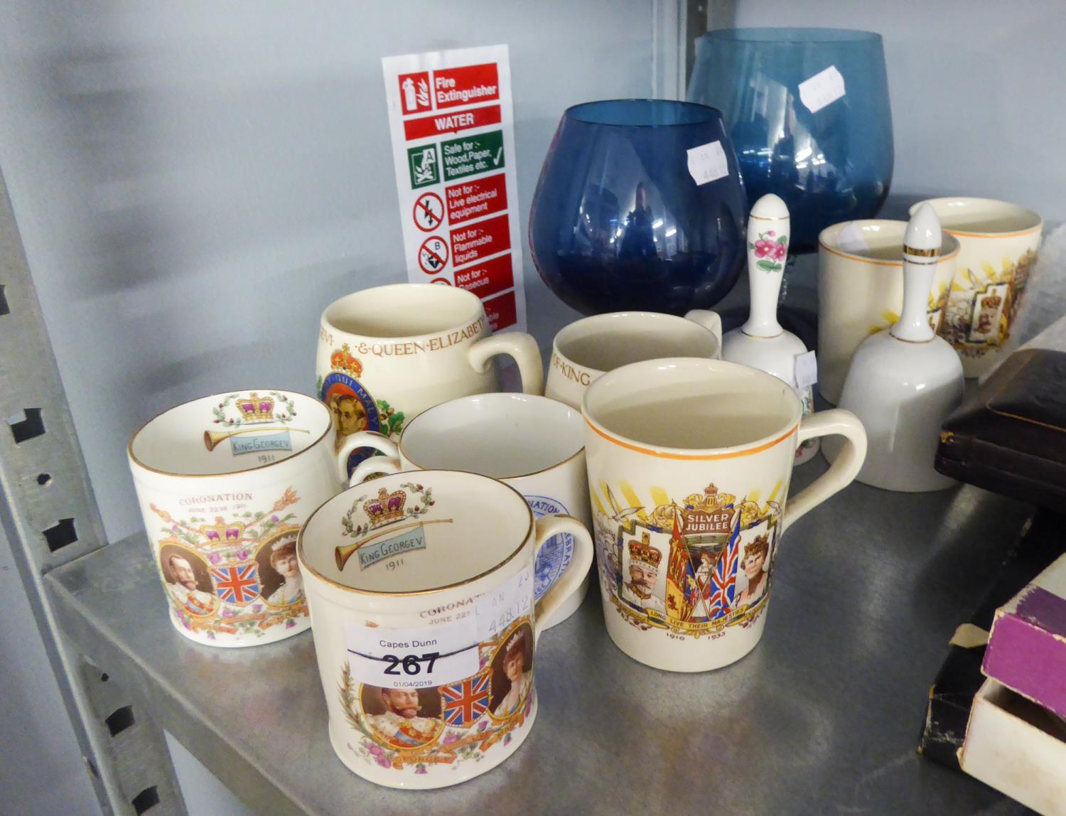 SEVEN ROYAL MEMORABILIA MUGS. TOGETHER WITH HAND BELLS, A BLUE GLASS BRANDY BALLOON ETC....