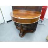 A VICTORIAN MAHOGANY DEMI LUNE TABLE HAVING RAISED BACK, THE BASE WITH CENTRAL CABRIOLE SUPPORT,