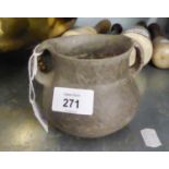 AN INTERESTING POSSIBLY ANCIENT TWO HANDLED BURNISHED CLAY POT, 3 1/2" (9cm) HIGH