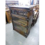 A THREE SECTION 1930's GLOBE WERNICKE OAKBOOKCASE, WITH LEADED GLAZED DOORS