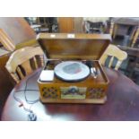 A SMALL MODERN OAK TABLE TOP RADIOGRAM