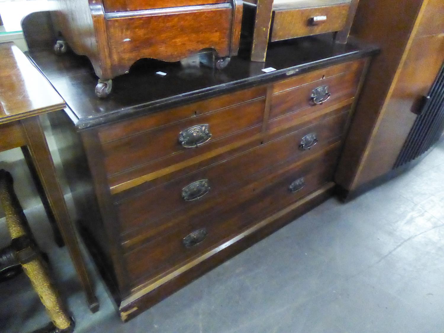 A DRESSING CHEST OF TWO SHORT AND TWO LONG DRAWERS, WITH FRAMELESS MIRROR