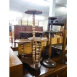 A SMOKER'S STAND, A FOUR SECTION DISPLAY STAND AND A TEA TROLLEY WITH DRAWER (3)