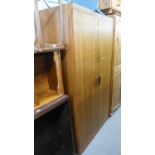 A TEAK G-PLAN TWO DOOR WARDROBE