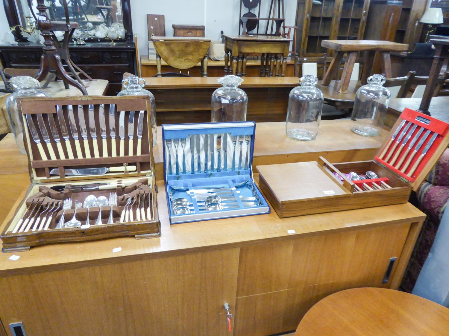 A 'SANENWOOD' PART CANTEEN OF CUTLERY IN TEAK CUTLERY BOX, ANOTHER CANTEEN OF CUTLERY IN OAK CASE