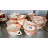 A 38 PIECE LATE VICTORIAN PORCELAIN TEA SERVICE, TRANSFER PRINTED IN BRICK RED (38)