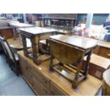 A GOOD QUALITY NEST OF THREE DISTRESSED OAK TABLES AND A SIMILAR SMALL DROP-LEAF TABLE (2)