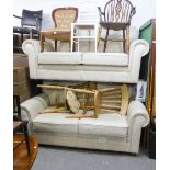 A PAIR OF MODERN TWO SEATER CREAM HIDE SETTEES