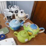 FIVE TEAPOTS, ONE DECORATED 'FERRY ACROSS THE MERSEY', WHITTARD DECORATED WITH LEMONS ETC....