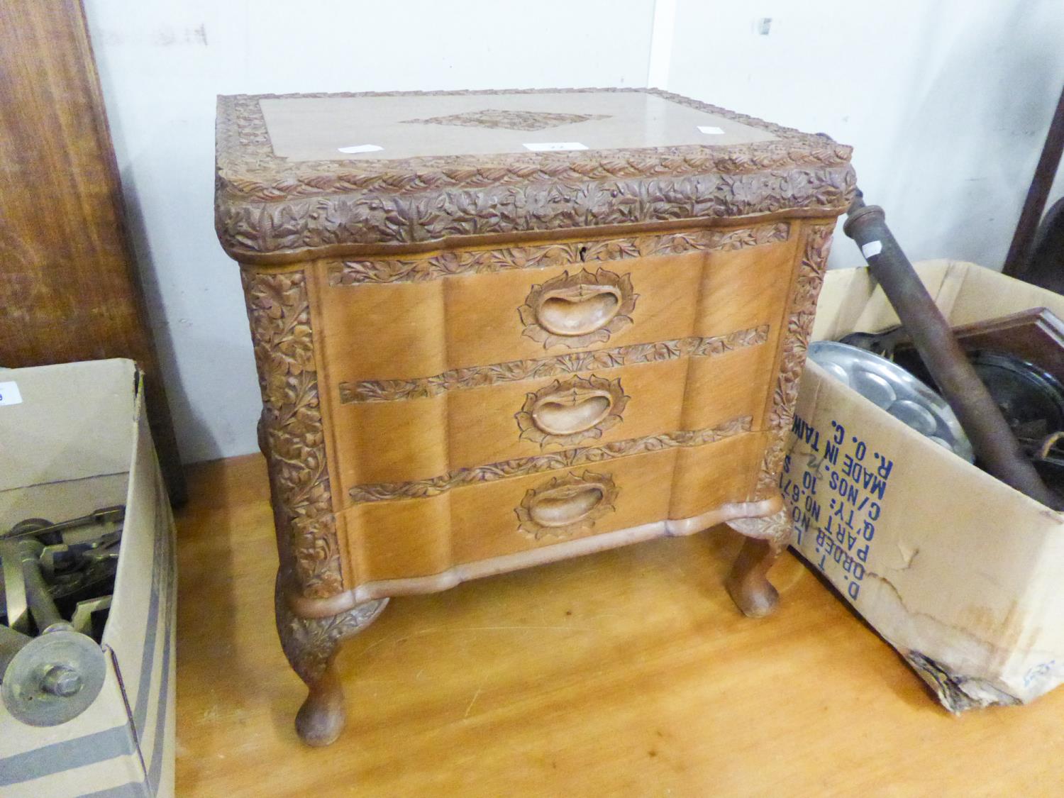 A POST-WAR INDIAN CARVED WOODEN SMALL CHEST FOR NEEDLEWORK, WITH BASAL DRAWER