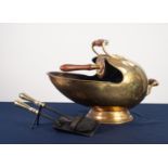 A LATE VICTORIAN/EDWARDIAN BRASS HELMET SHAPED COAL SCUTTLE, together with an original WOODEN