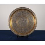 PERSIAN, HEAVY, CIRCULAR BRASS TRAY with all-over chased decoration and silver coloured metal