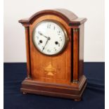 EDWARDIAN INLAID MAHOGANY MANTLE CLOCK, the 4 ½” enamelled Arabic dial powered by an eight day