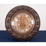 CIRCA 1900 AUSTRIAN CIRCULAR 8 DAY WALL CLOCK, the foliate carved centre within a chapter ring, with