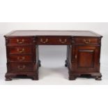 MODERN REPRODUCTION MAHOGANY STAINED TWIN PEDESTAL PARTNER’S DESK, with gilt tooled dark red leather