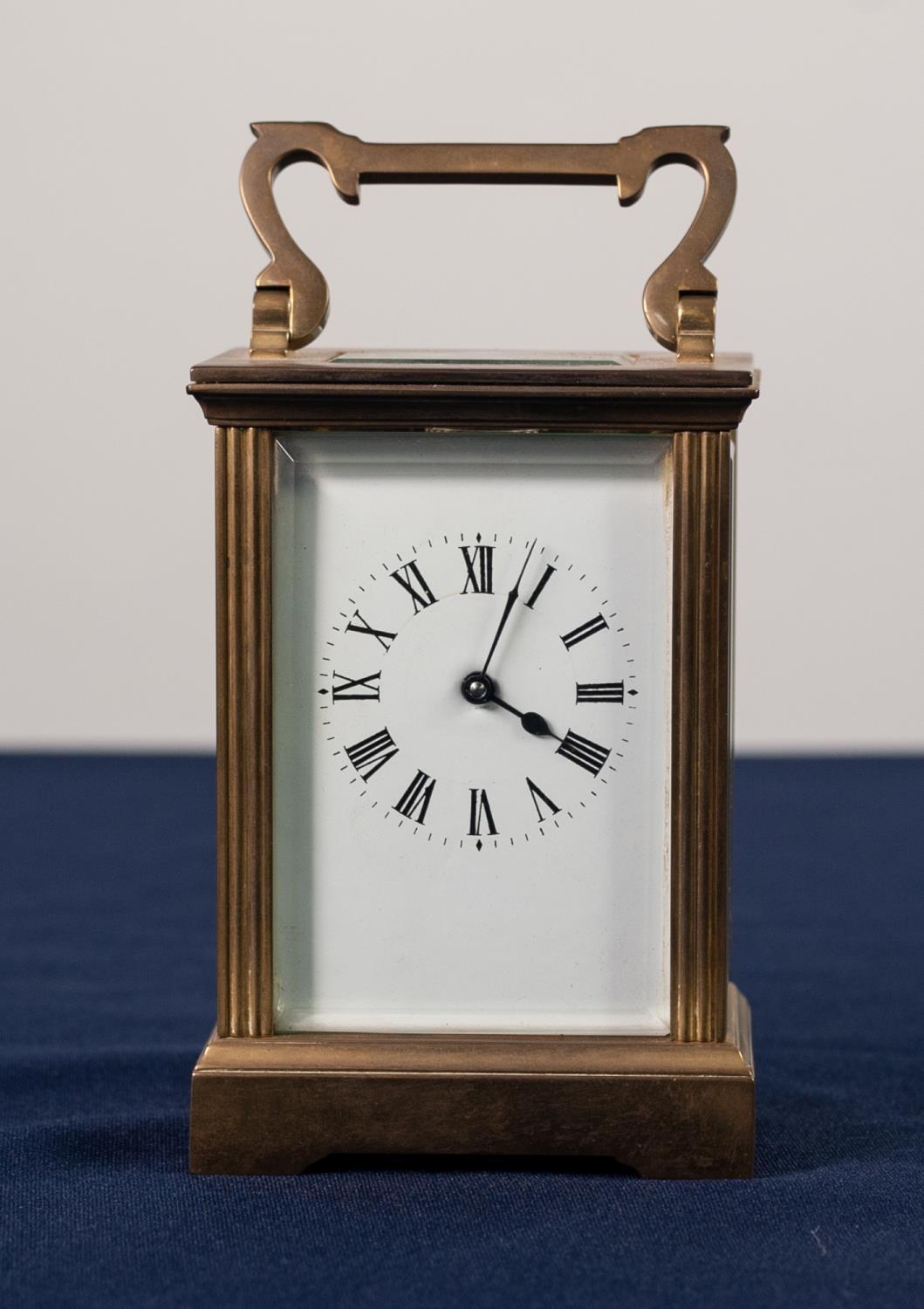EARLY TWENTIETH CENTURY FRENCH BRASS CASED CARRIAGE CLOCK, the enamelled Roman dial powered by a - Image 2 of 3