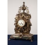 IMPRESSIVE EARLY TWENTIETH CENTURY LARGE BRASS MANTLE CLOCK, the 4” Arabic dial powered by an