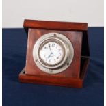 COWEY, KEW GARDENS, EIGHT DAY DASHBOARD CLOCK, circular with winder to the base and hinged, chrome