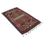 EASTERN FLAT WEAVE BORDERED RUG with intricate four panel design with a repeated pattern in rows