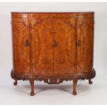 GOOD QUALITY MID TWENTIETH CENTURY CARVED AND FIGURED WALNUT ‘D’ SHAPED SIDE CABINET IN THE QUEEN