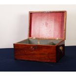 VICTORIAN LINE INLAID AND CROSSBANDED MAHOGANY BOX, of oblong form with brass lion mask captive ring