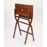 EDWARDIAN INLAID MAHOGANY FOLDING WRITING TABLE, the compartmented brown leather lined interior with