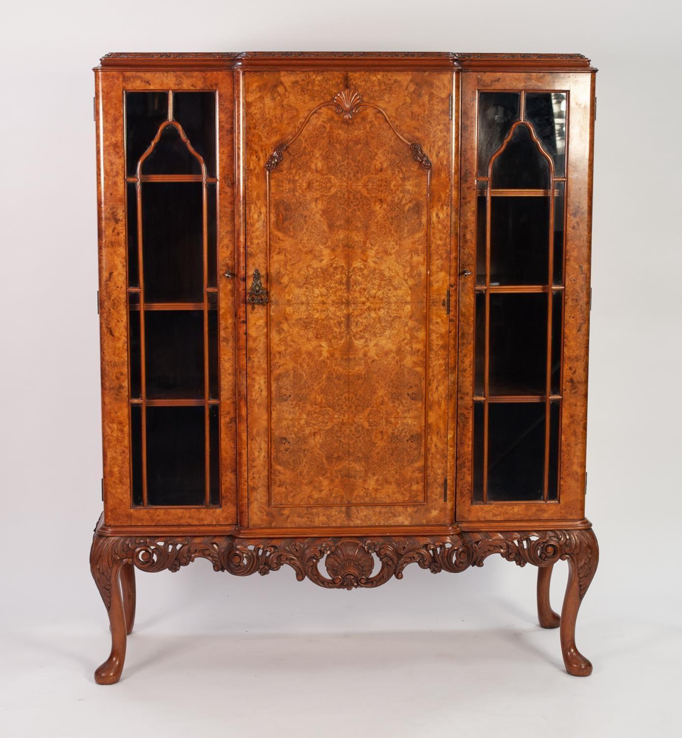 GOOD QUALITY MID TWENTIETH CENTURY CARVED AND FIGURED WALNUT DISPLAY CABINET IN THE QUEEN ANN TASTE,