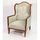 EDWARDIAN SATINWOOD CROSSBANDED MAHOGANY WING ARMCHAIR, the square section show wood frame enclosing