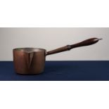 ANTIQUE TINNED COPPER DEEP PAN with turned wood handle, 8 ¼” (21cm) diameter, the handle, 14” (35.